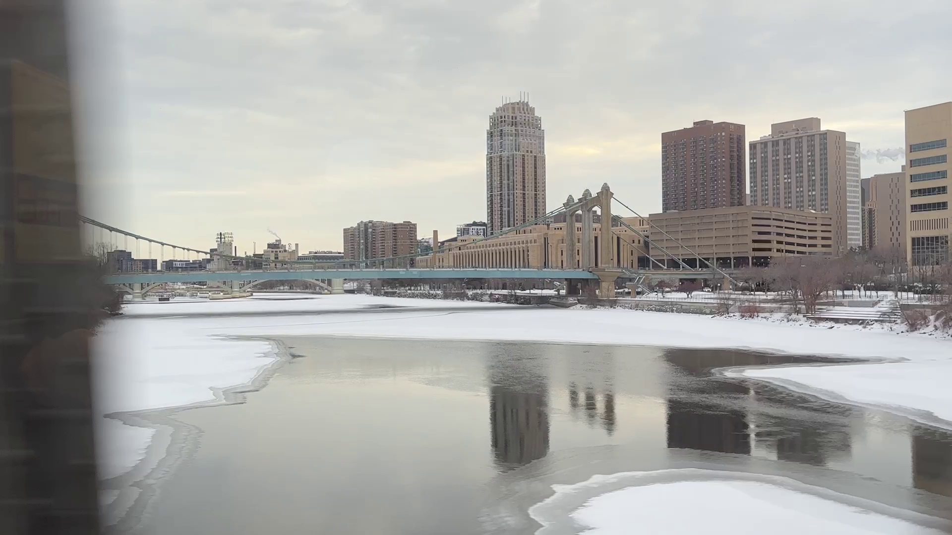 The view southbound from the Nicollet Island Silver Railroad Bridge crossing the Missippi River.