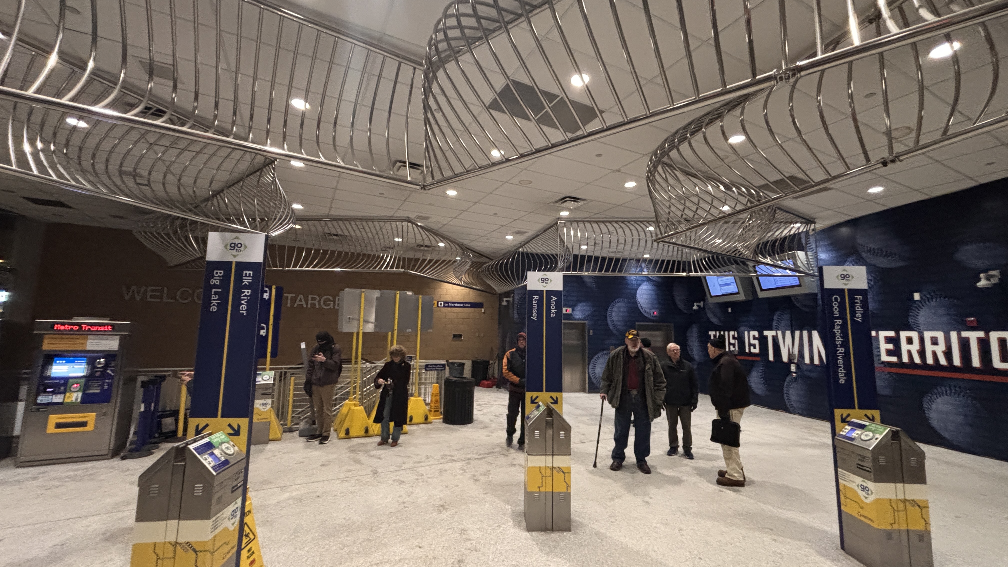 Target Field Station's ground level entrance, featuring Go-to readers for each station on the line